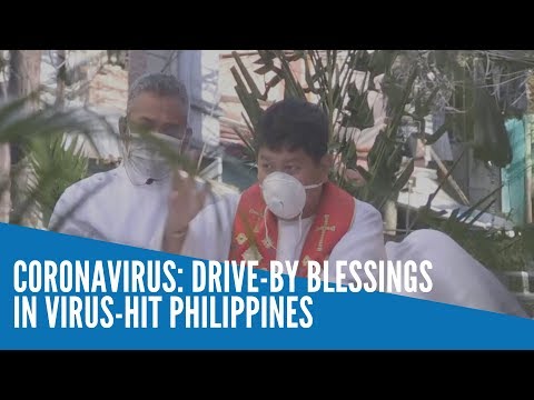 Drive-by blessings in coronavirus-hit Philippines on Palm Sunday