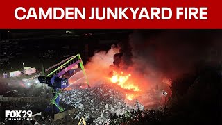 Firefighters battle junkyard fire in Camden, air quality concerns remain