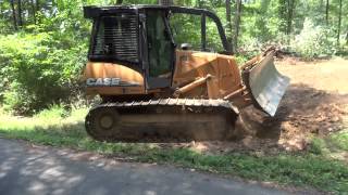 Case dozer pushing trees