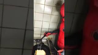 Spider man cooks grilled cheese