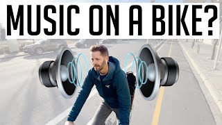 Should you listen to music while riding a bike? I tested headphones and speakers while riding