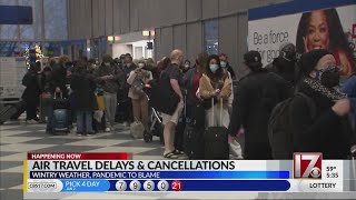 COVID, weather causing flight delays, cancellations