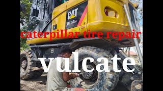 #caterpillar tire repair#caterpillar wheel excavator#