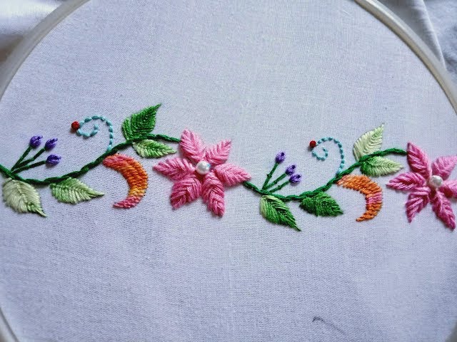 Hand embroidery.  Hula flower stitch. Border design.