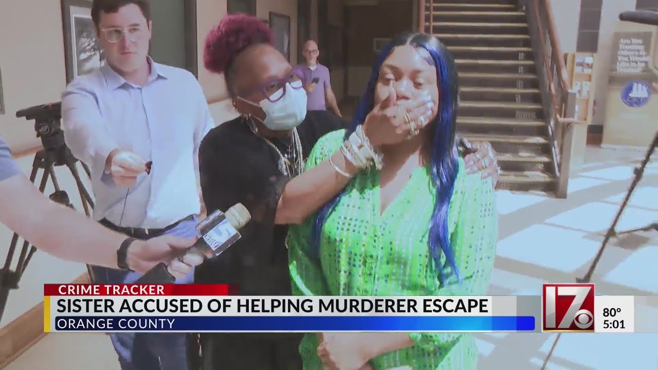 Sister accused of helping murderer escape appears in court - YouTube
