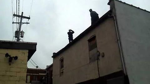 Bushman throws ac off of roof