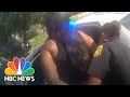 Watch: Officer Points Gun At Black Woman For Over 4 Minutes In Suspected Stolen Car | NBC News NOW
