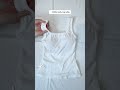 👗 This tank top? Straight-up MAGIC. Show me your style!#StyleInspo #WhiteTankTop #fashion
