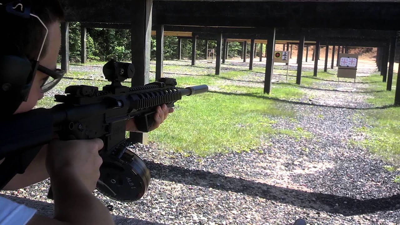 Smith & Wesson m&p 15 22 suppressed with drum mag - YouTube