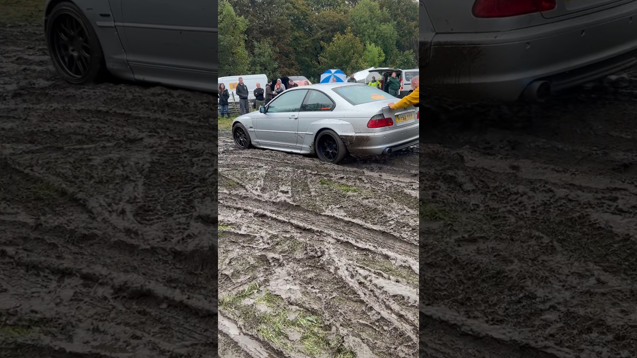 Cars stuck in the muddy field 