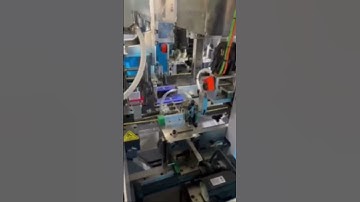 Paper bag rope inserting machine, automatic paper bag handle inserting machine