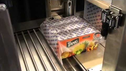 Trays Being Shrink Wrapped with Random Printed Film