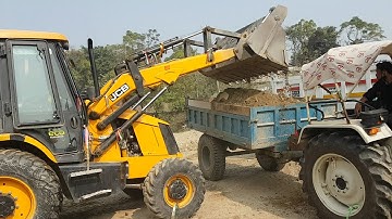 JCB Backhoe Collecting Gravel and Loading in Tractor - JCB Machine Working on Crusher
