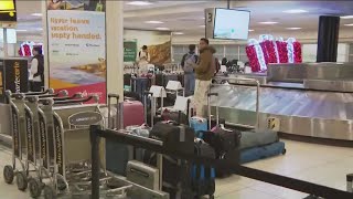 Airlines scramble to recover from Christmas storms across the country