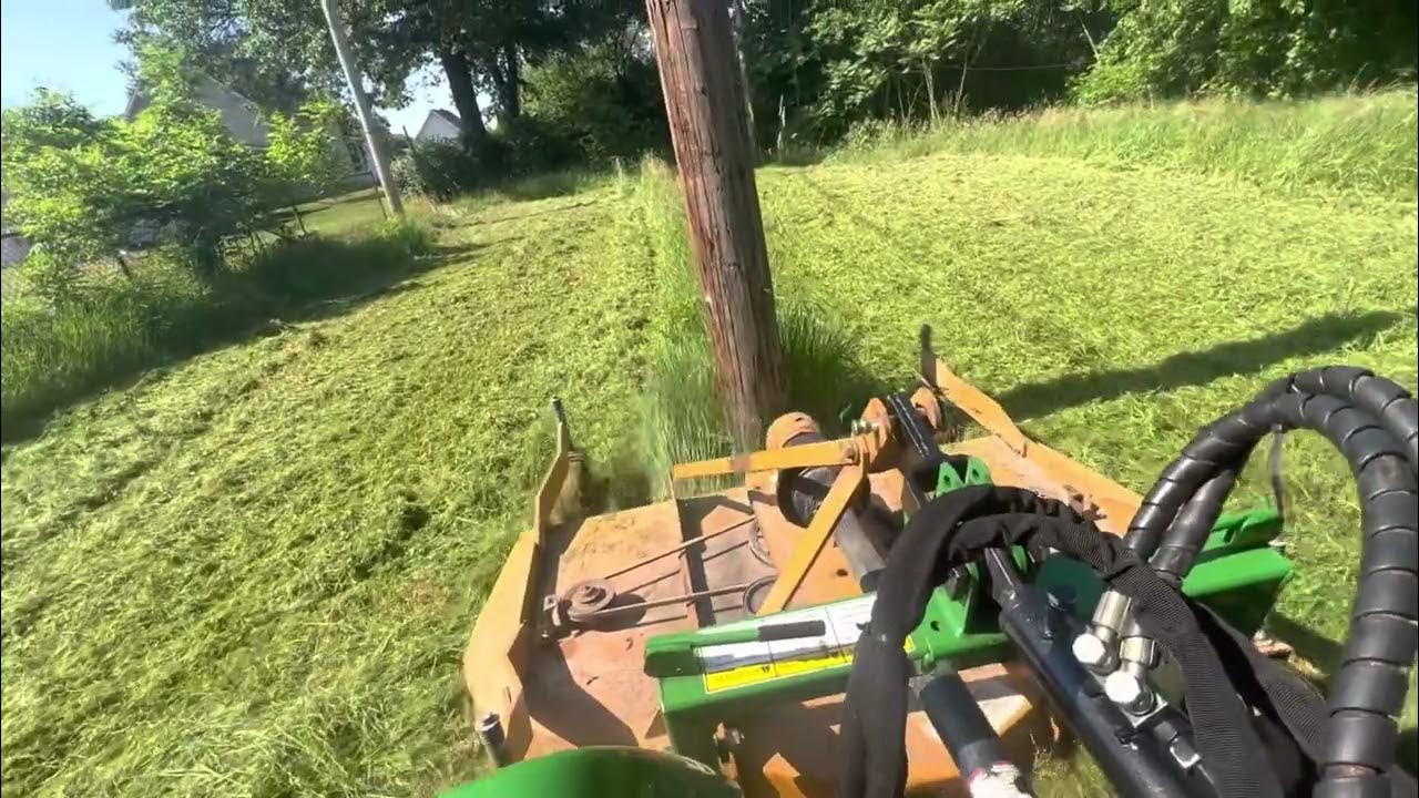 Mowing tall grass with woods rd7200 finish mower on John Deere 2038R