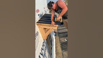 More roofing tin going on more door and window awnings #construction #workshop #tools