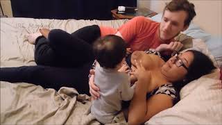 Breast feeding with baby and husband