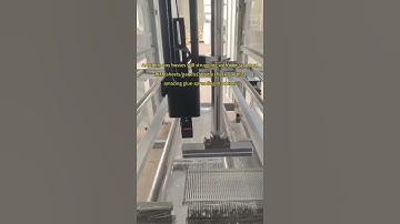 Honeycomb partition board glue spraying machine.