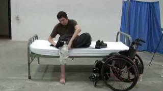 Quadriplegics: bed mobility and dressing