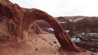 Drone video flying around Corona Arch Moab