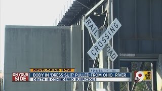 Body in 'dress suit' pulled from Ohio River