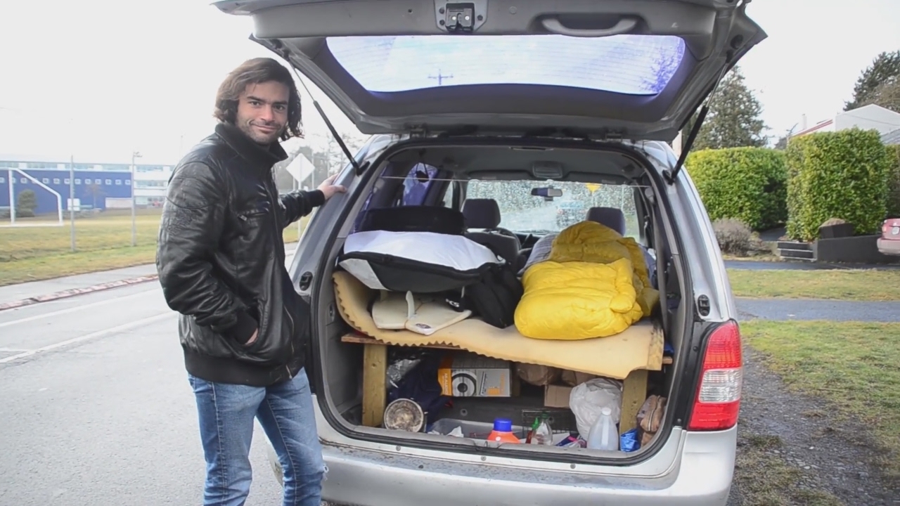 tour of a stealth minivan camper conversion ex software developer