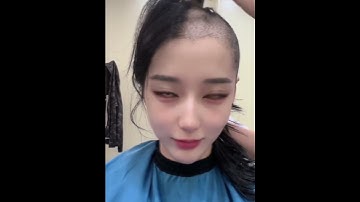 cô gái cạo trọc đầu vì thất tình