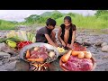 Yummy! Beef grilled on the rock with chili sauce for dinner - Survival cooking