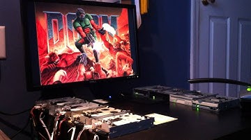 Doom - E1M1 on eight floppy drives
