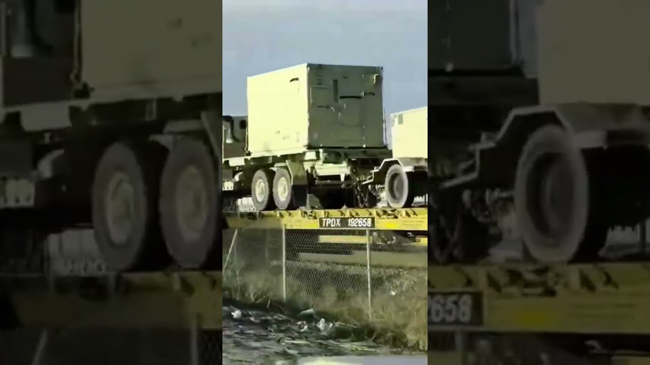 Military train rolling through Denver 