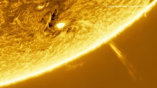 Solar Flare, Coronal Loop, CME Eruption and lot's of Clouds in Action!