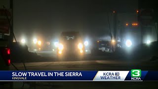 Drivers deal with delays due to snow on I-80 in the Sierra