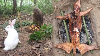Primitive Technology: Simple rabbit trap in the forest and bake it in an aboriginal way