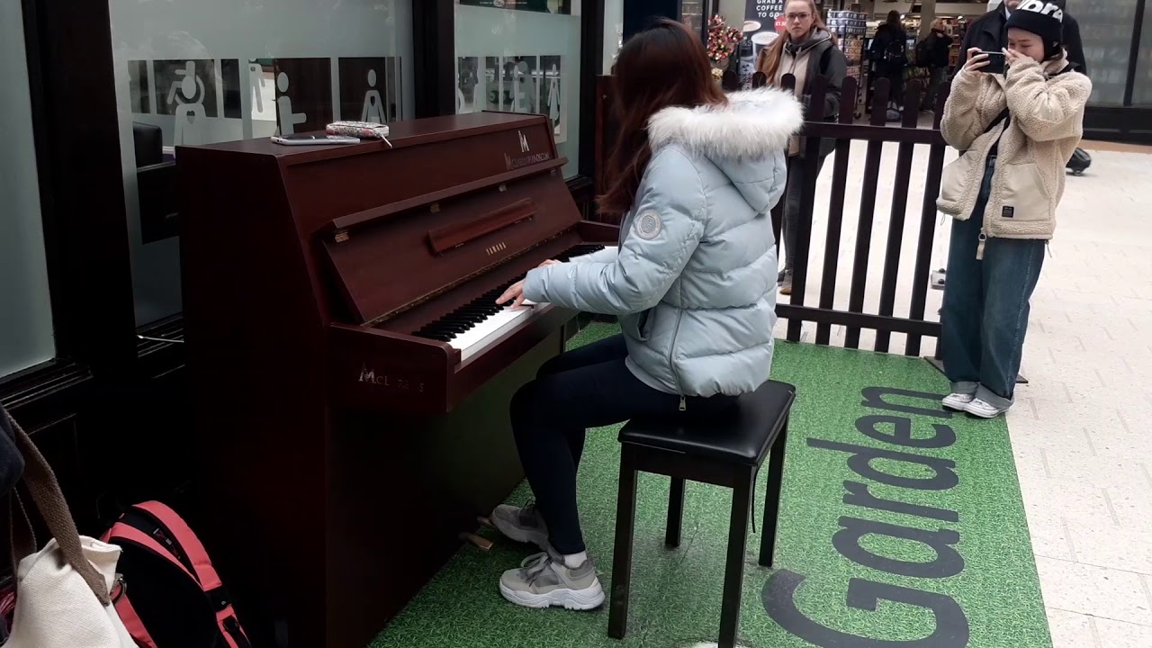 Talented girl playing piano at Glasgow central station YouTube