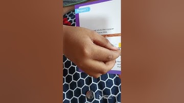 making paper circuits using lythium batteries, led bulb and copper tape from Einstein kit..