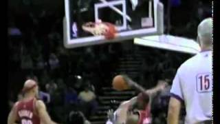 Lebron dunks over Tim Duncan!
