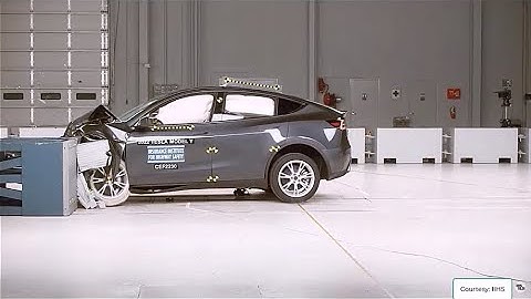 Frontal Crash Design Optimization with System Simulation