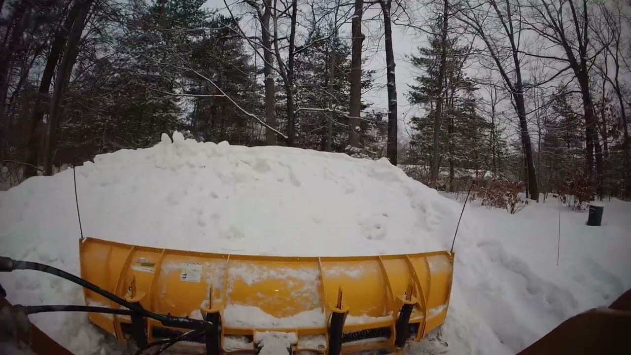 Fisher xrs plow on cat track skid steer plowing snow