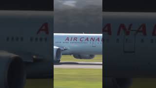 Air Canada 777-300 er touching down into Brisbane , operating out of Vancouver #aircad #777