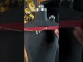 Red leather strap, dangling hardware, easy edge