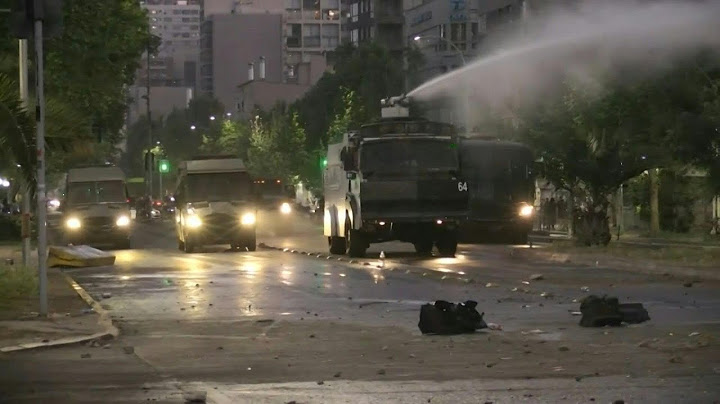 Chilean police fire tear gas, water cannons at anti-government protesters | AFP