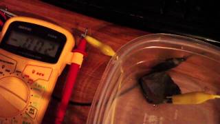 Rock electrode makes other electrodes negative