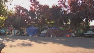 Eviction notices go up at camp site near Cleveland High School, neighbors express concerns
