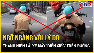Bất ngờ lý do người đàn ông 1 tay lái xe máy như ‘diễn xiếc’ trên đường ở Bình Dương| Báo VietNamNet