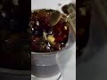 a spice being cooked in hot oil by a chef