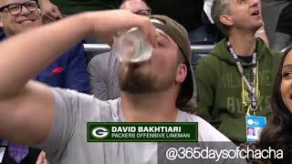 Where was David Bakhtiari if not protecting Aaron Rodgers? Chugging beerS, Bucks playoffs games