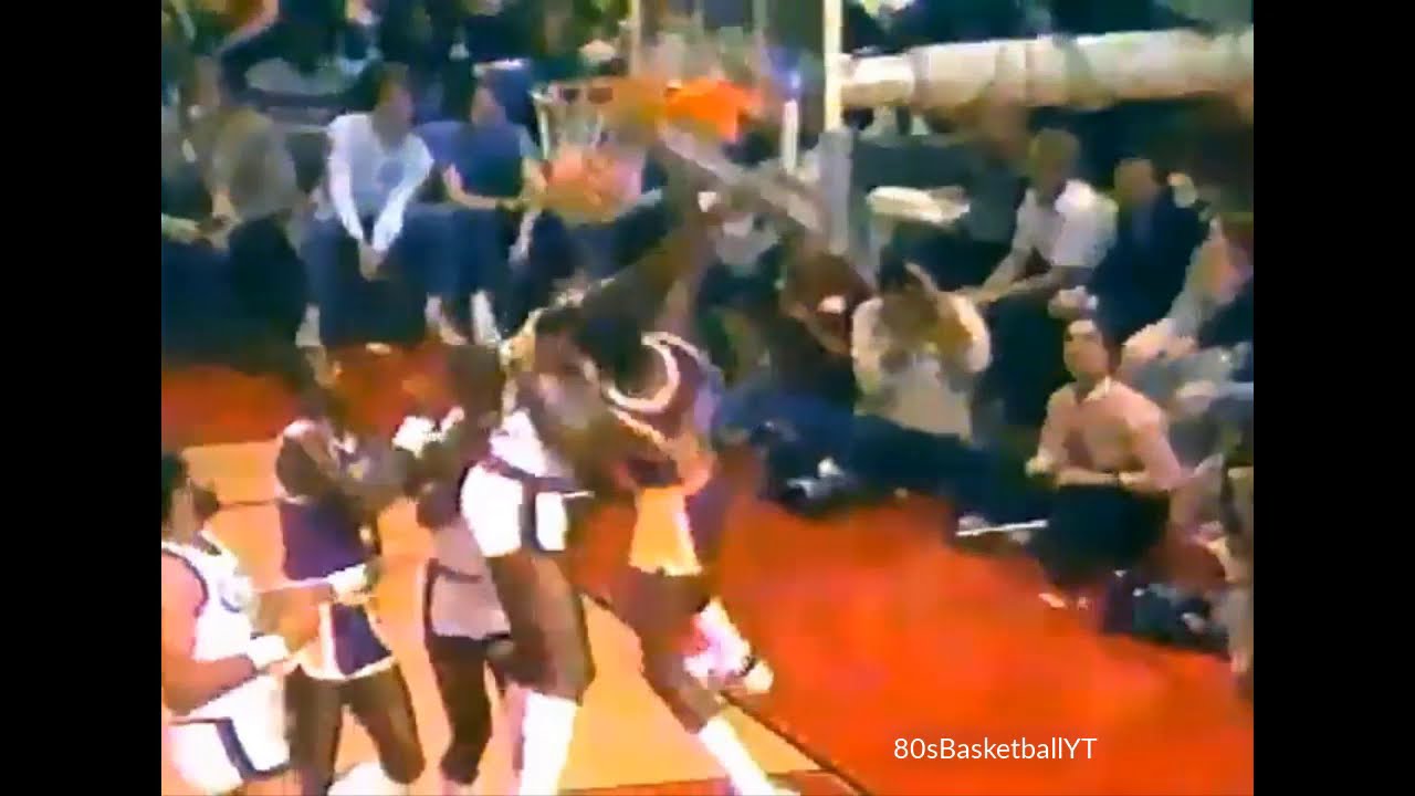 Magic Johnson Posterizes Harvey Catchings