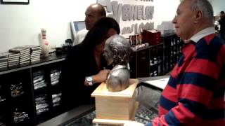dad at hardcore pawn detroit meeeting cast and signing statue