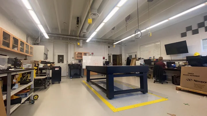 Installing a large optical table at CVISS Lab