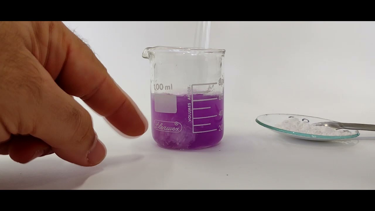 15 - Reação de óxido de cálcio com água.